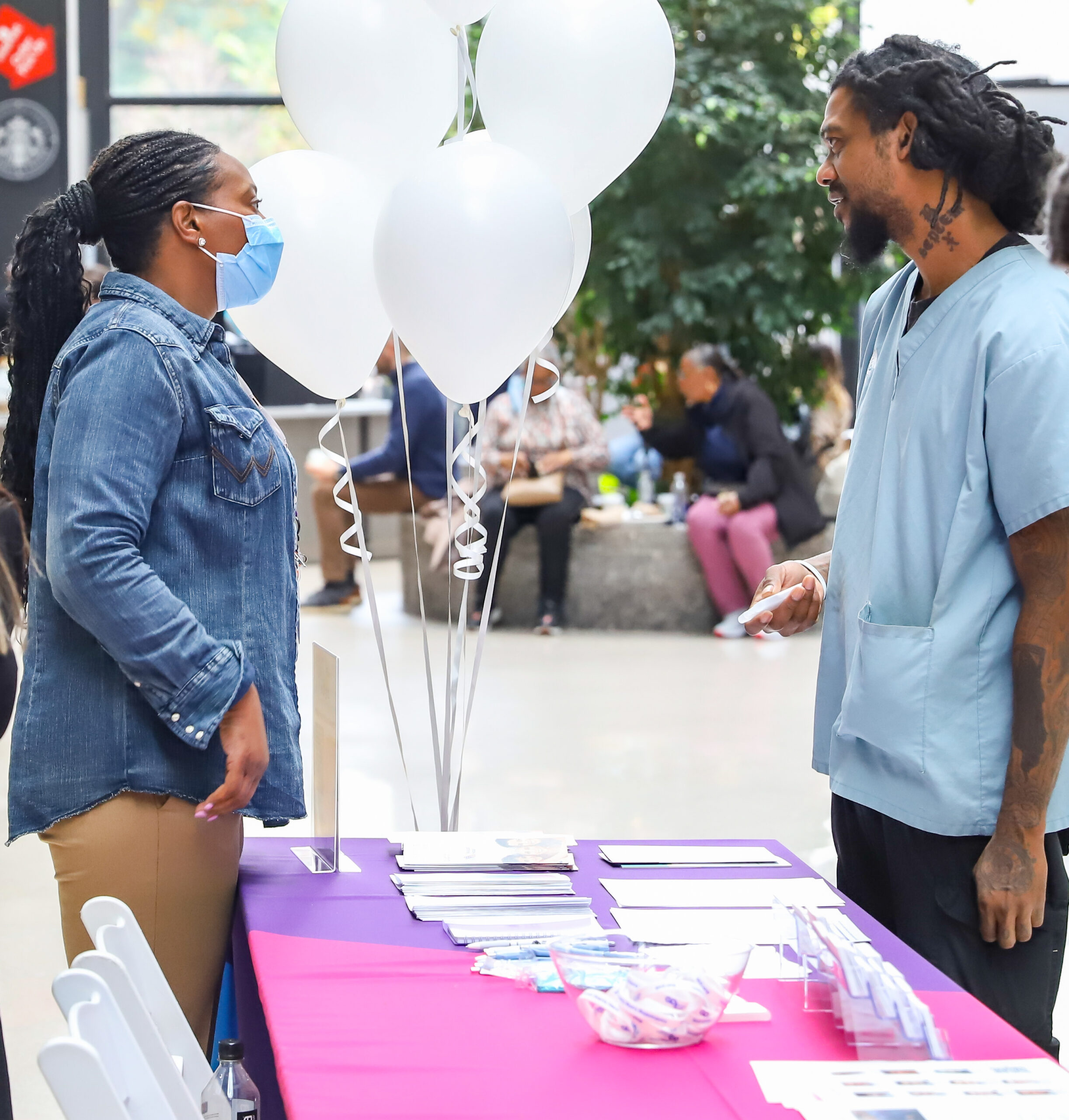 Clinical Research Coordinator discussing early lung cancer screening. Photo by Roger Britton.