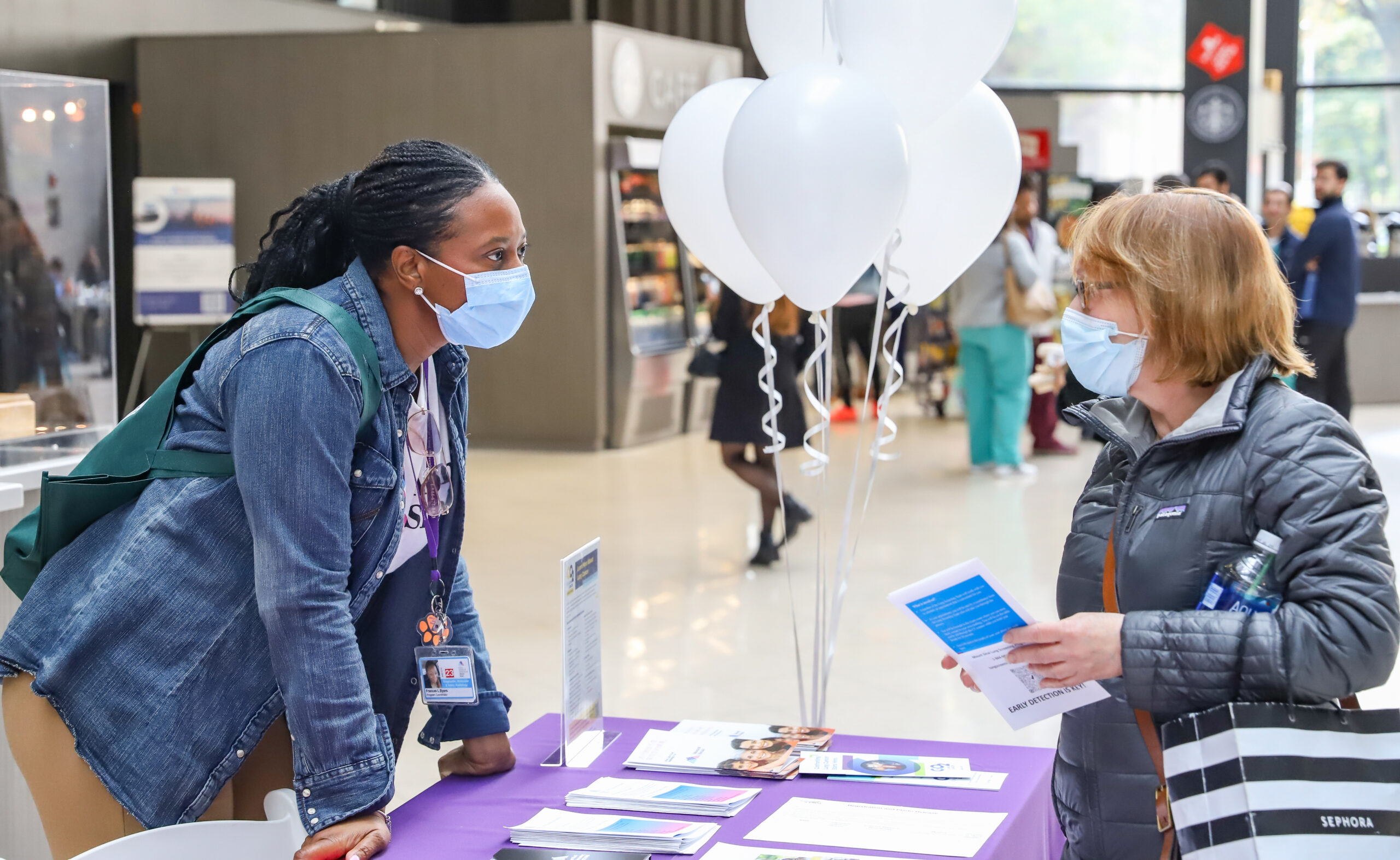 Clinical Research Coordinator discussing early lung cancer screening. Photo by Roger Britton.
